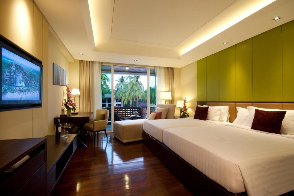 גרייסלנד קאו לאק ביצ'פרונט ריזורט (Graceland Khaolak Beachfront Resort)